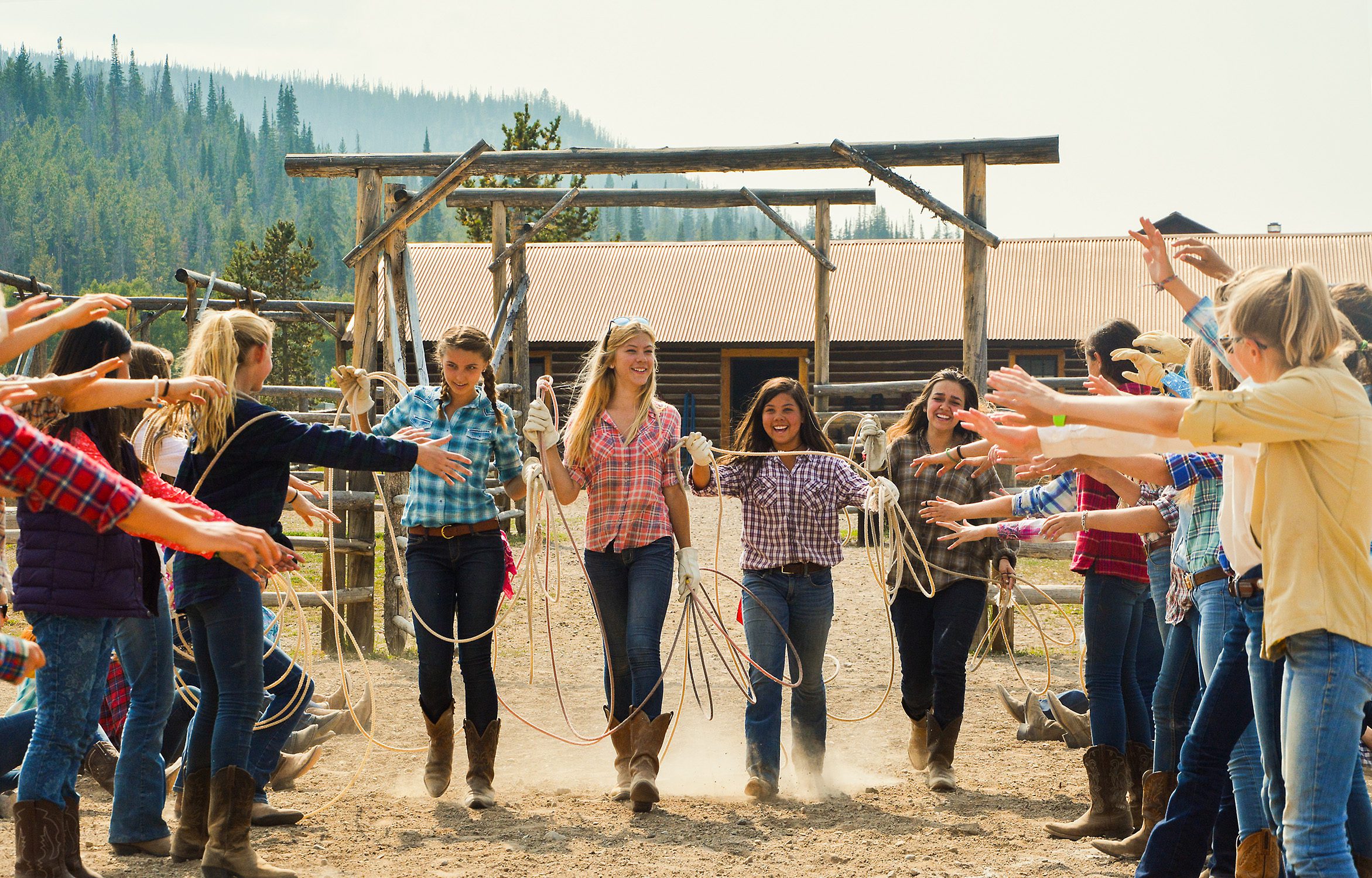 Girls entering rodeo ring.